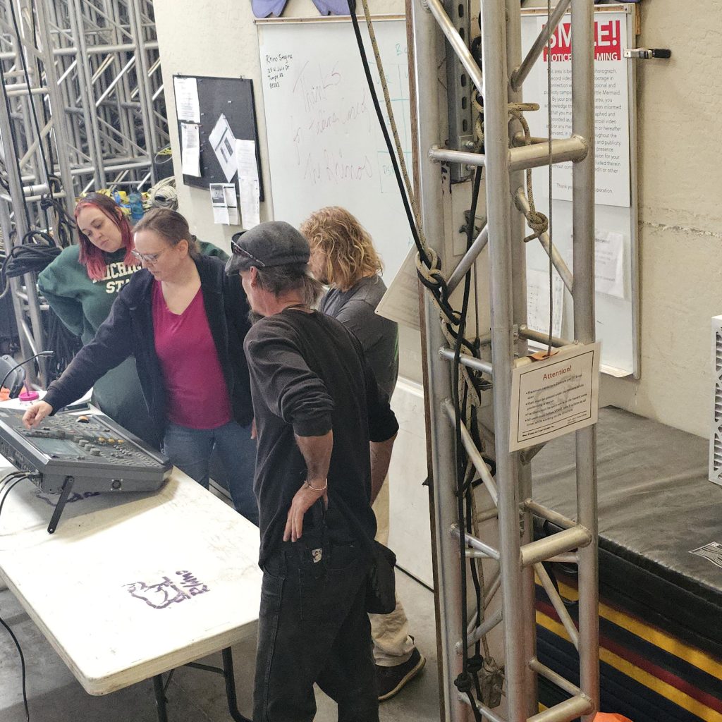 Carolyn DuRoss, second from left, conducting a lighting tech training at Rhino's Tempe, AZ facility.