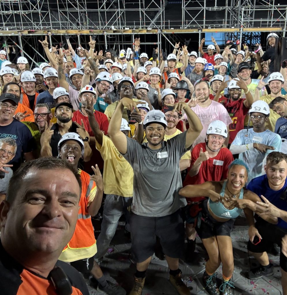 Rhino TN crew members pose together after loading out Coldplay's July 22, 2025 show at Nissan Stadium in Nashville.