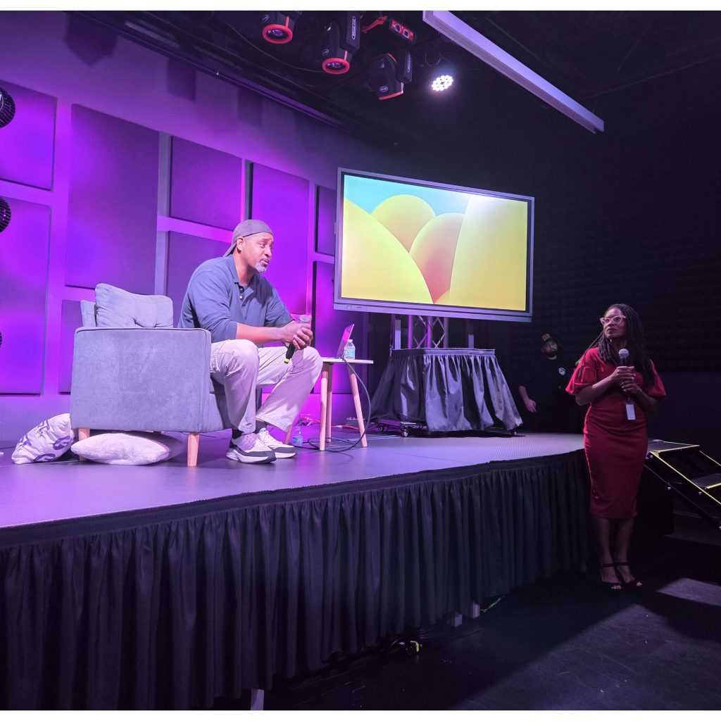 Rhino Florida's Recruiting & Hiring Coordinator Ryan Council at the Florida Institute of Recording, Sound, and Technology (F.I.R.S.T Institute) in Orlando on 12/04/25 for a recruiting event. At right is Ketsia Gustave, Program Director, Recording Arts & Show Production. She served as the event moderator.