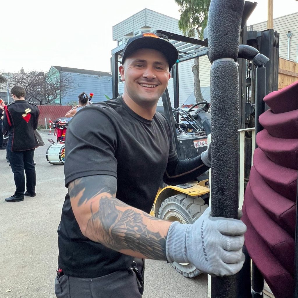 Rhino Northern California team member loading in chairs at the Castro Theater, San Francisco, CA.